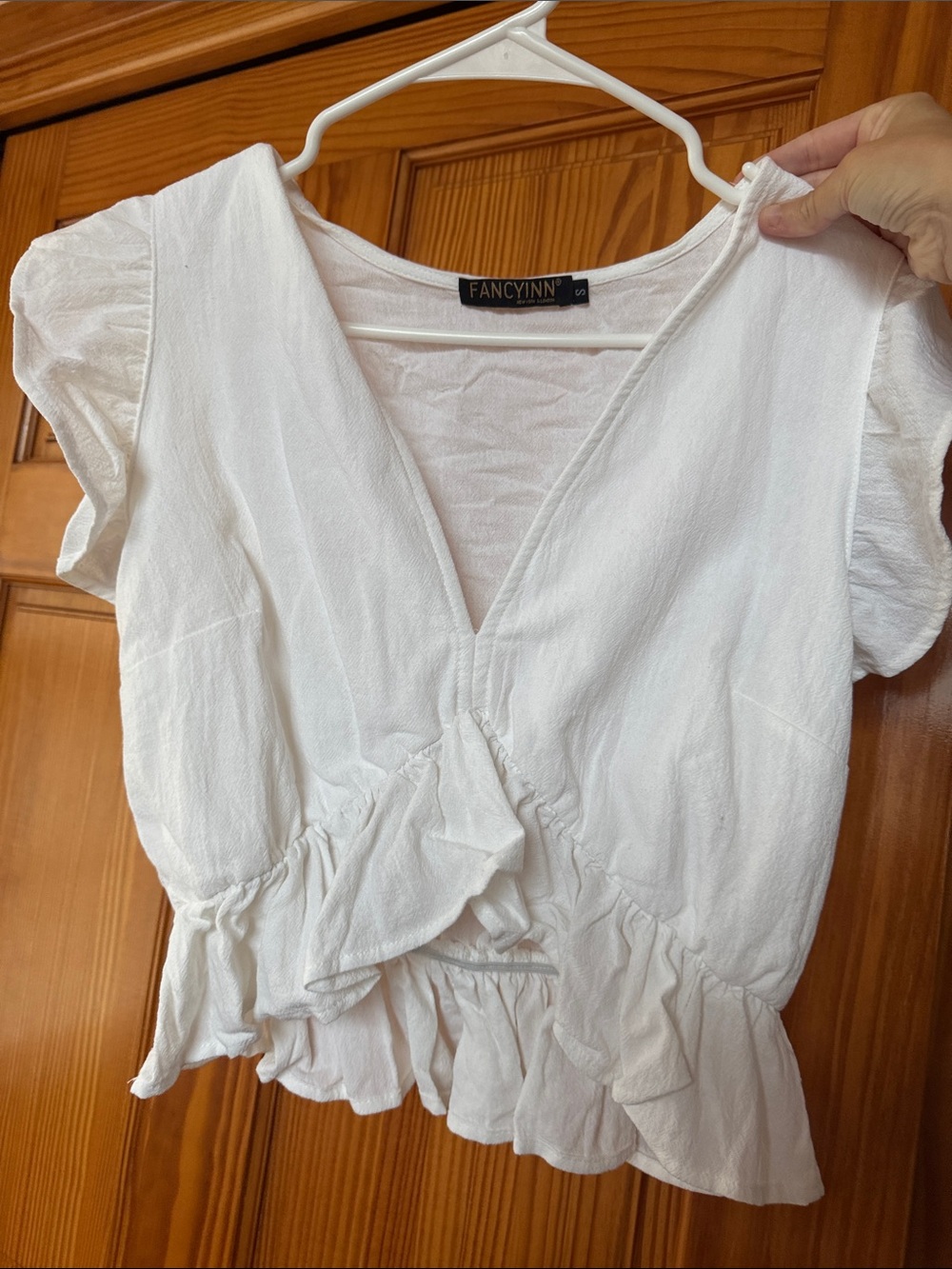 FANCYINN White V-Neck Ruffle Peplum Blouse